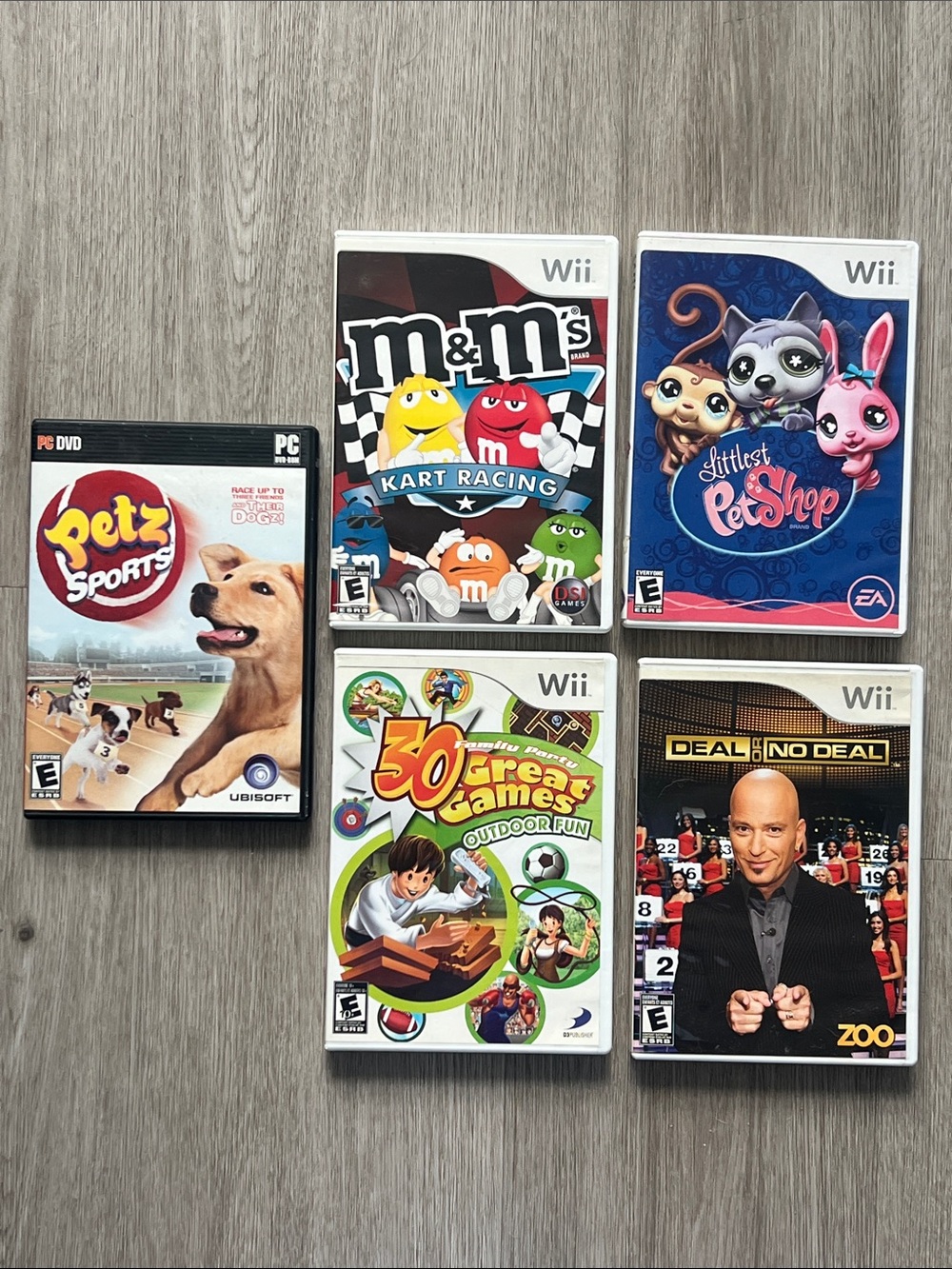 (4 Nintendo Wii)+(1 DVD)